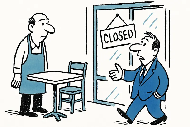 Empty restaurant terraces and closed storefronts along Palma’s Paseo Marítimo promenade.