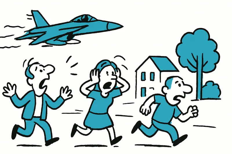 F-18 fighter jet flying low over Son Ferriol, casting a shadow over houses and startling people in the street.